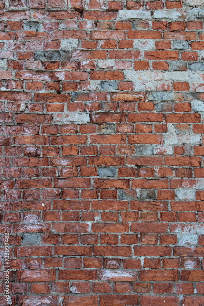 A brick wall with a hole in it A brick wall with a hole in it