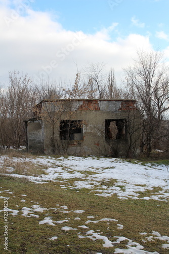 A building with a hole in the ground