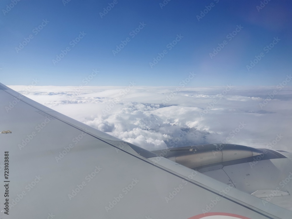 The view from the plane from the window of the plane. A view from the plane. The view from the plane from the window of the plane. A view from the plane.
