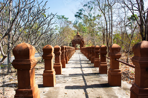 Landscape forest on mountain hill route walkway for thai people travelers travel visit trailing hiking to respect praying buddha and Luang Pu Dune Atulo at Phanom Sawai Forest Park in Surin, Thailand photo