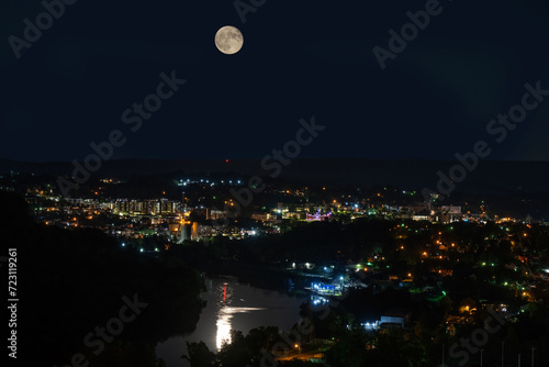 Composite of full moon over Morgantown West Virginia - It is the same moon that night but moon has been enhanced and enlarged for the scene