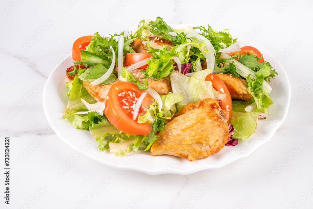 Weight loss, Healthy lifestyle, diet food, sport and fitness concept. Fresh balanced vegetable and chicken breast salad with fruit, fitness equipment, dumbbell, measuring tape on a white background Weight loss, Healthy lifestyle, diet food, sport and fitness concept. Fresh balanced vegetable and chicken breast salad with fruit, fitness equipment, dumbbell, measuring tape on a white background