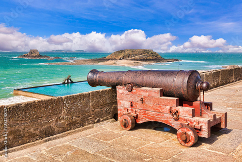 Cannon looking out over the bay at Saint Malo, Brittany, France. Focus on cannon.