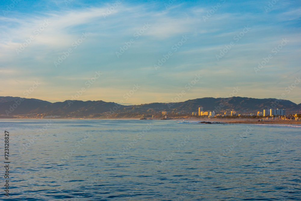 Santa Monica beach with the santa Monica mountains in the background. Picture took in the picture from the venice fishing pier.