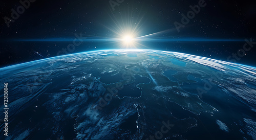 3d earth from outer space with a sun rising like a st