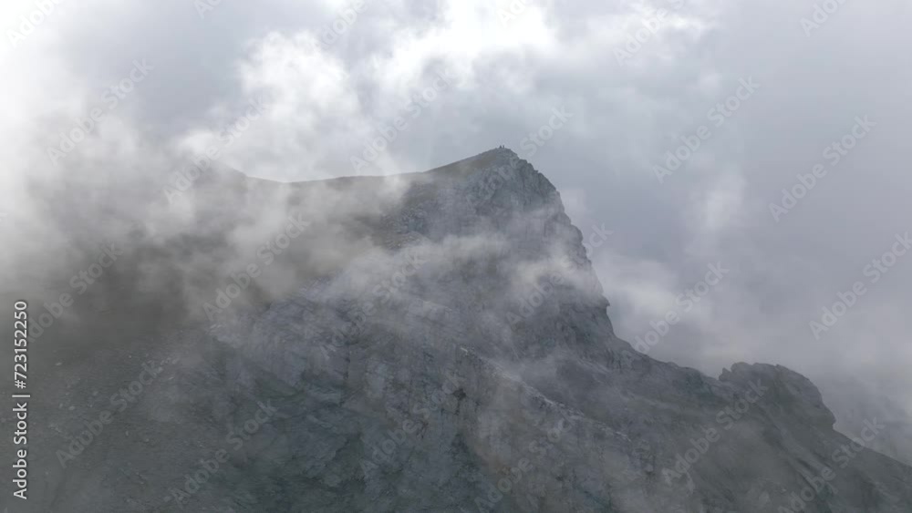 Cloudy mountain, hill aerial 4k cinematic landscape with two people Olympus Cloudy mountain, hill aerial 4k cinematic landscape with two people Olympus