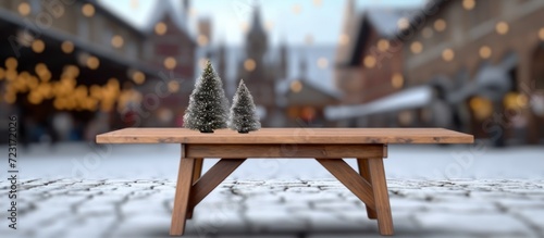Empty table with small pine tree on winter