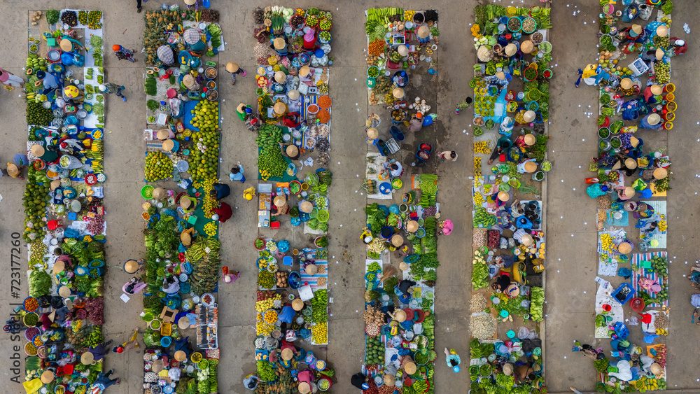 Aerial view of busy local daily life of the morning local market in Vi Thanh or Chom Hom market, Vietnam