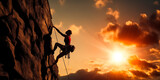 silhouette of a young woman climbing a rock face at sunset - outdoors and adventure sports concept