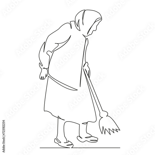 grandmother sweeps with a broom
