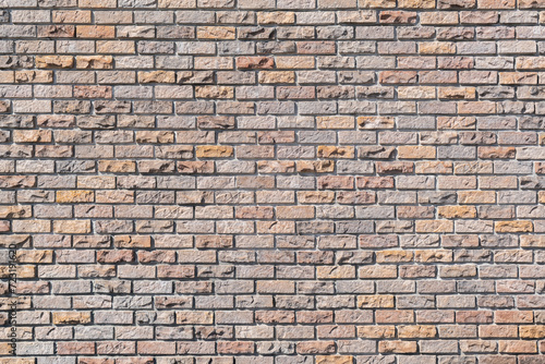 Brick wall of red and yellow color  old brick wall texture background - outdoor setting