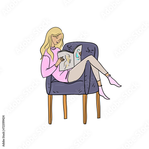Beautiful woman sitting and reading a magazine.