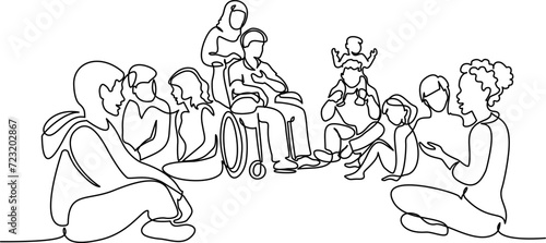Group of people different nations and ages sitting on ground together