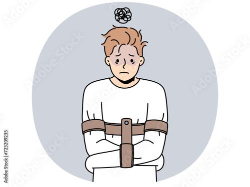 Stressed man in straitjacket suffer from mental problems. Unhappy guy struggle from psychological issues in psychiatric hospital. Vector illustration.