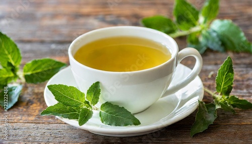 tulsi tea served in a cup with tulsi leaves tulsi has many benefits for body and mind