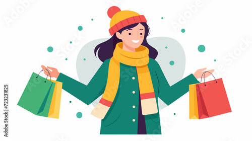 Happy woman enjoying winter shopping spree with colorful bags