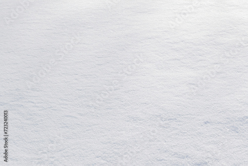 White clean shiny snow background texture. fresh snow seamless texture. snowy surface closeup