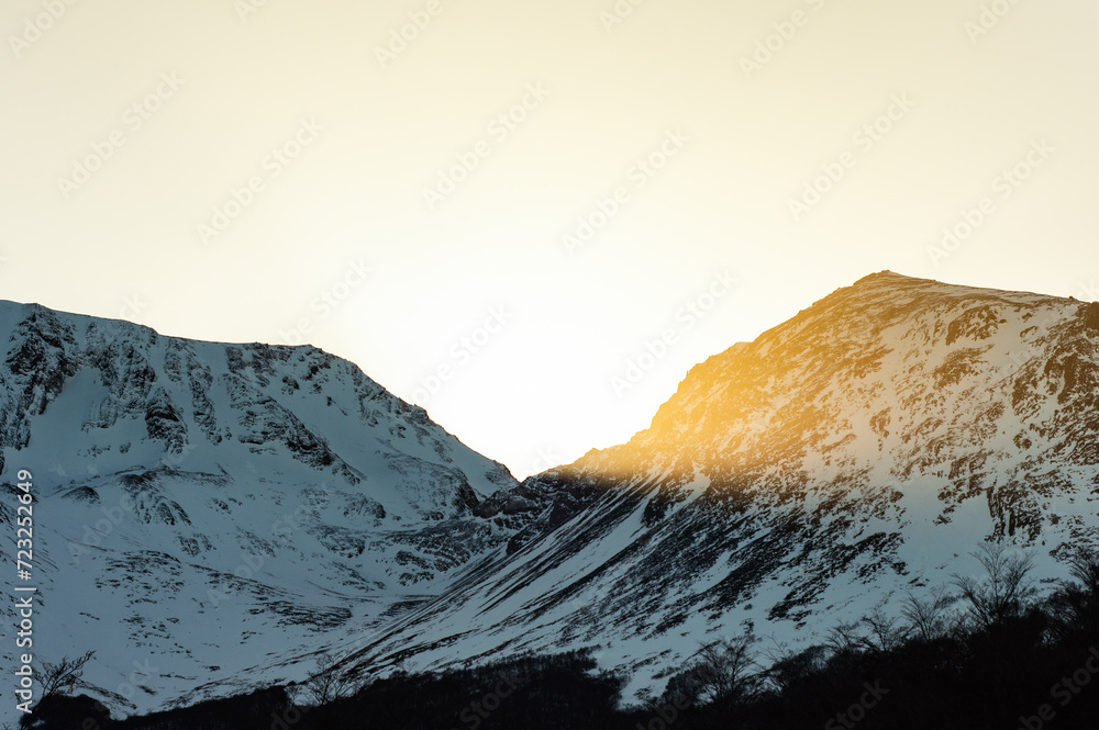 Stream of meltwater on the heights of a snowy mountain. Ushuaia Emerald Lagoon in winter