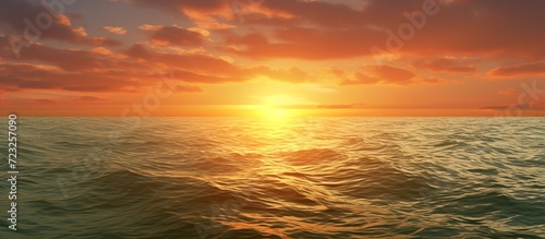 Calm sea with sunset sky and sun through clouds above. Meditation sea and sky background.