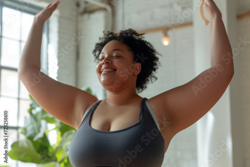 Free Download Joyful Woman Celebrating Body Positivity and Confidence in Fitness Attire - GFXLoad