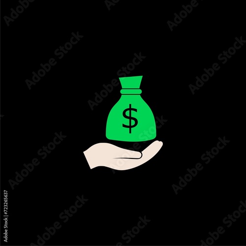 Hand holds cash bag in Dollars symbol isolated on black background