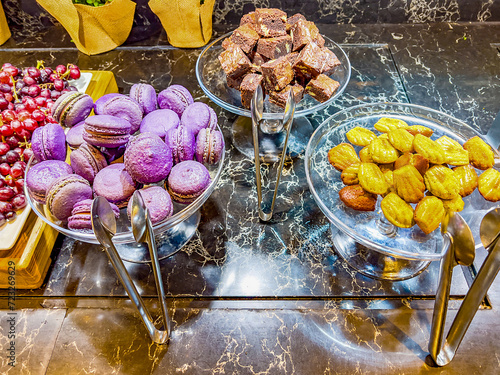 Candy bar. Table with sweets, candies, fruits, dessert buffet