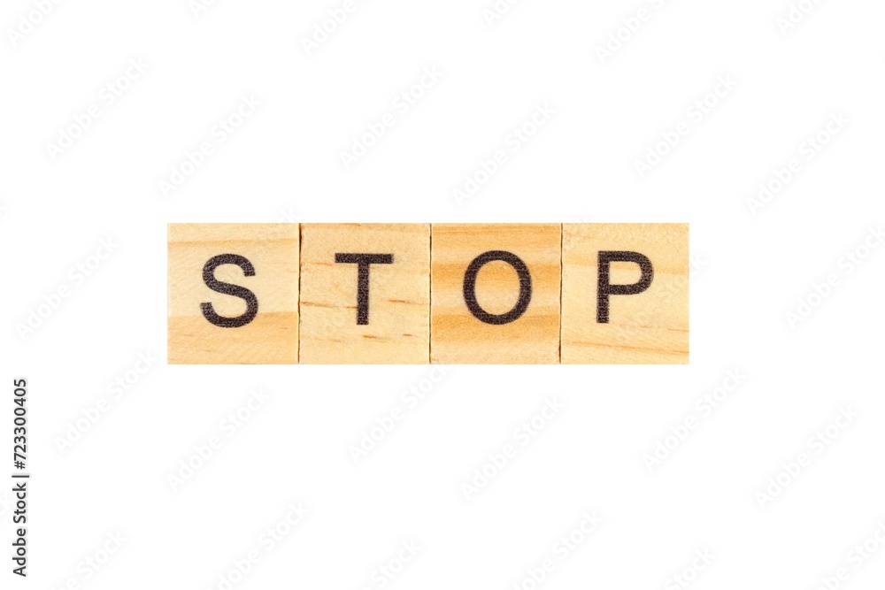 STOP word written on wood block, isolated on isolated on white background. top view. STOP word written on wood block, isolated on isolated on white background. top view.