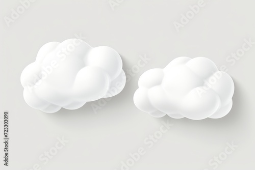 Two white clouds on a gray background. Suitable for various design projects © Fotograf