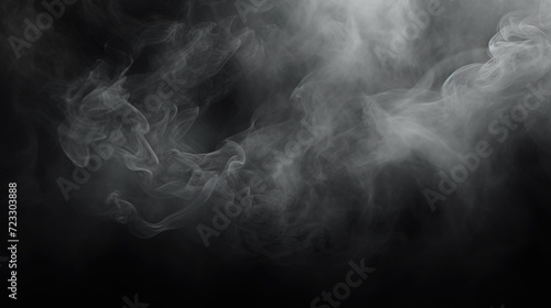 Close up shot of smoke on a black background. Suitable for various graphic design projects