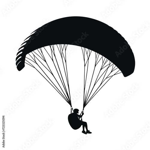 Dynamic Paraglider Silhouette Against Sky