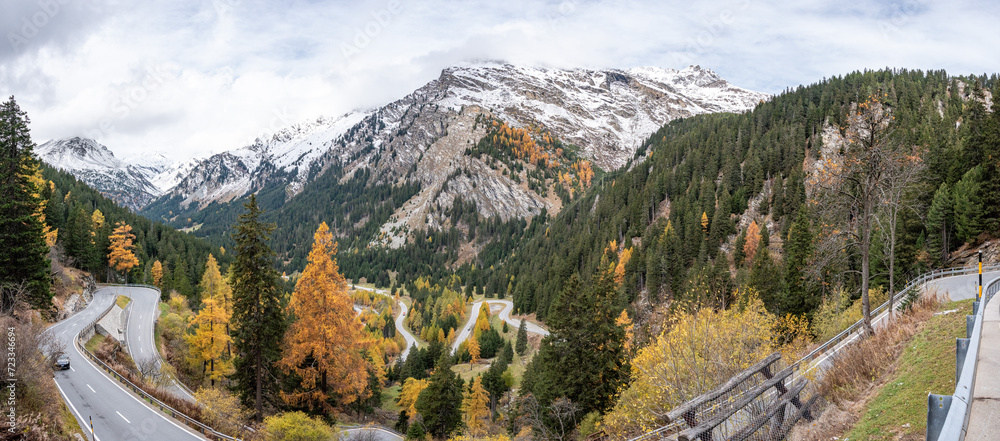 Scenic winding road at Maloja pass in autumn