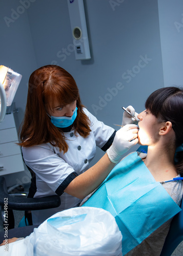 Hospital concept of mouth treatment. Teeth making dentist hands.