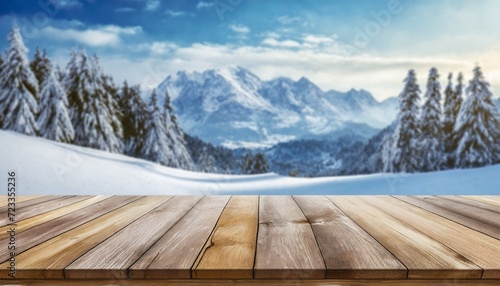 empty table in beautiful winter landscape wood plank board in snow mountain outdoor comeliness © Slainie