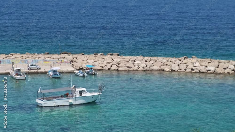 Mediterranean Sea harbor boasting beautiful blue waters at Agios Georgios Pegeias, Paphos, island of Cyprus Mediterranean Sea harbor boasting beautiful blue waters at Agios Georgios Pegeias, Paphos, island of Cyprus