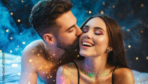 casal apaixonado na cama com glitter, conceito festa carnaval photo