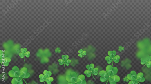 St. Patrick's day background. Flying green shamrocks on transparent background.
