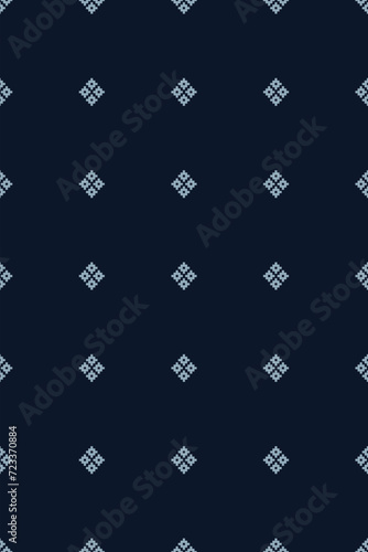 Traditional ethnic motifs ikat geometric fabric pattern cross stitch.Ikat embroidery Ethnic oriental Pixel navy blue background. Abstract,vector,illustration. Texture,scarf,decoration,wallpaper.
