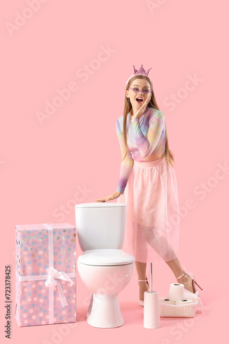 Young woman with toilet bow...