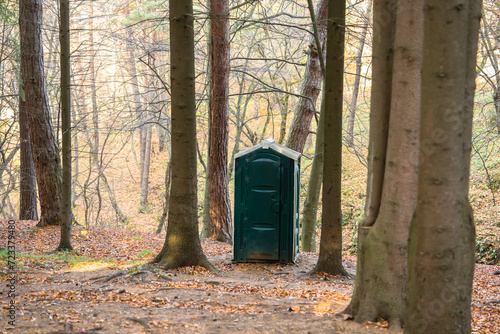 Green toilet cabin in the forest © Daniel