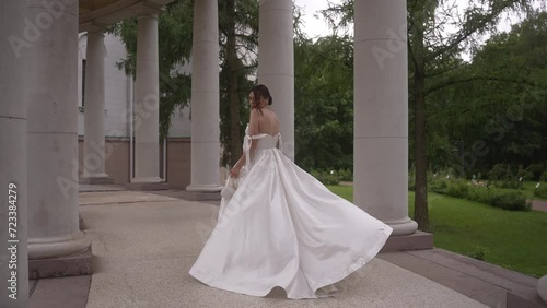 Slow motion footage of the walking bride.