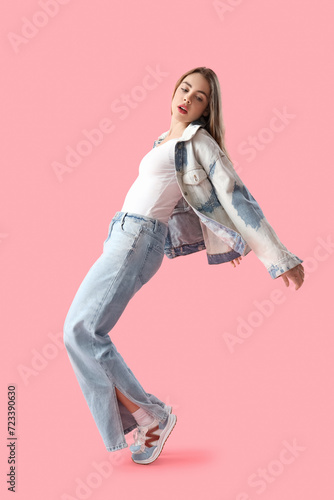 Young woman in light blue j...