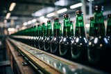 Beer bottles lined up on production line.