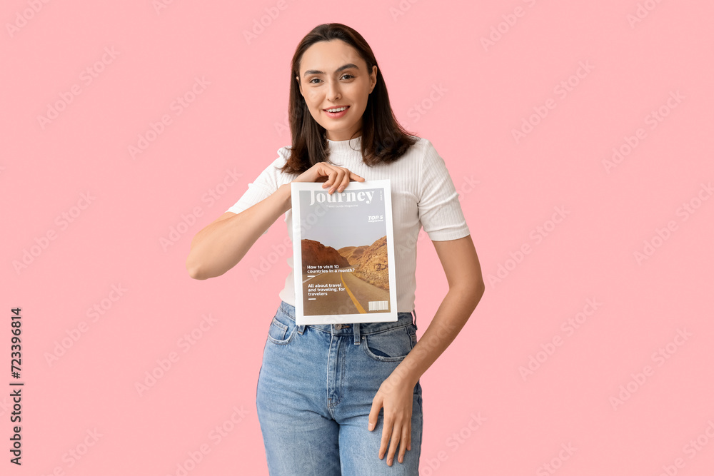 Beautiful young woman with journey magazine on pink background Beautiful young woman with journey magazine on pink background