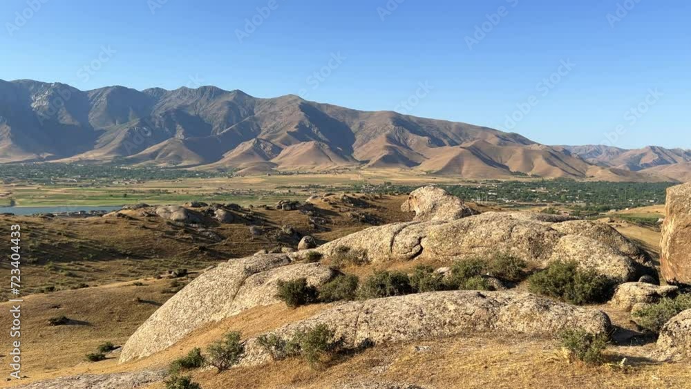 The Valley of Demons in Uzbekistan in the Samarkand region. Boulders, granite sculptures, huge boulders of bizarre shapes in the spurs of the Zaravshansky ridge. 4K Video The Valley of Demons in Uzbekistan in the Samarkand region. Boulders, granite sculptures, huge boulders of bizarre shapes in the spurs of the Zaravshansky ridge. 4K Video