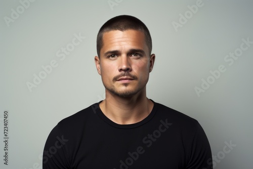 Portrait of a handsome man in a black t-shirt