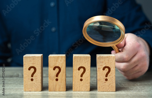Bilde på lerret A man with a magnifying glass solves a mystery