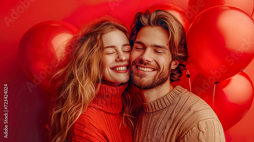 A couple on Valentine's Day, having fun together, with red balloons on a red background