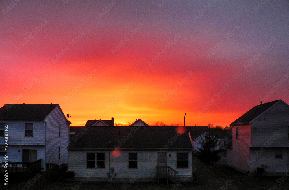 Brilliant Sunrise Over a Suburban Neighborhood
