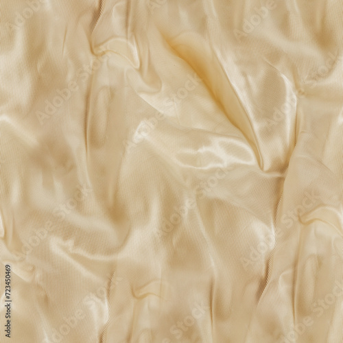 Seamless texture photo of beige colored wrinkled silk or satin drapery material.