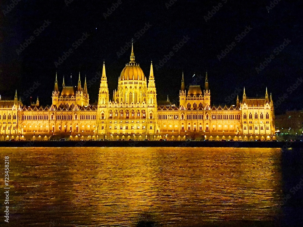 Hungary Budapest night sailing and view of Buildings infrastructures bridges landmarks in the city along Rhine river and Danube river
